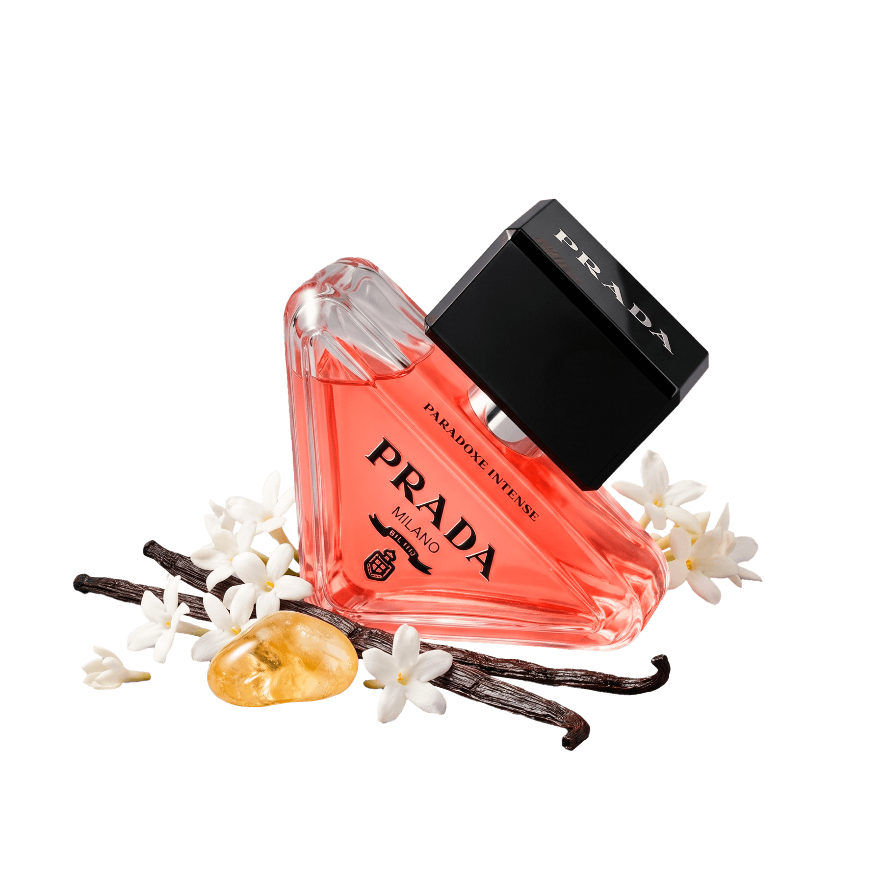 Prada Paradoxe Intense acompañado de flores blancas y ámbar